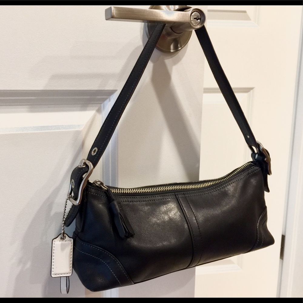 COACH black leather shoulder purse.  Blue thread
